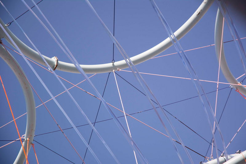 Plastic hoops and rods of an art installation.