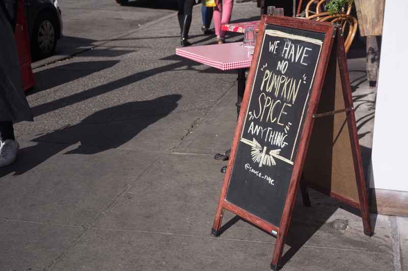 A restaurant's chalk sign proudly proclaims no pumpkin spice ANYTHING.