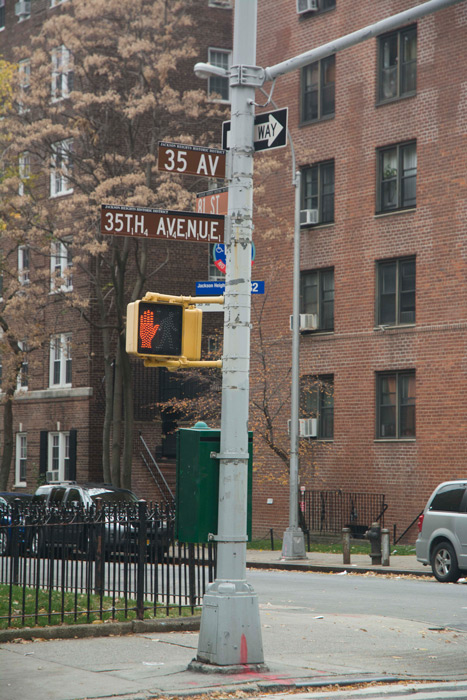 A street sign with Scrabble tile values, where Scrabble was invented.