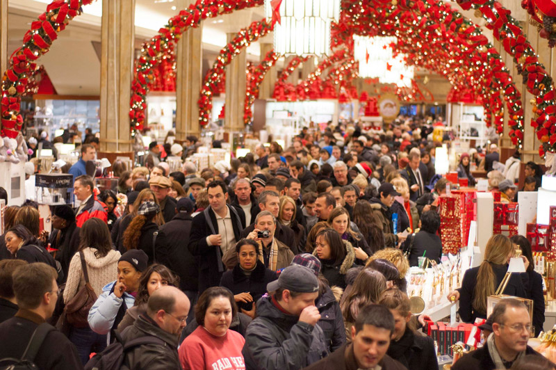 A department store, packed with shoppers.