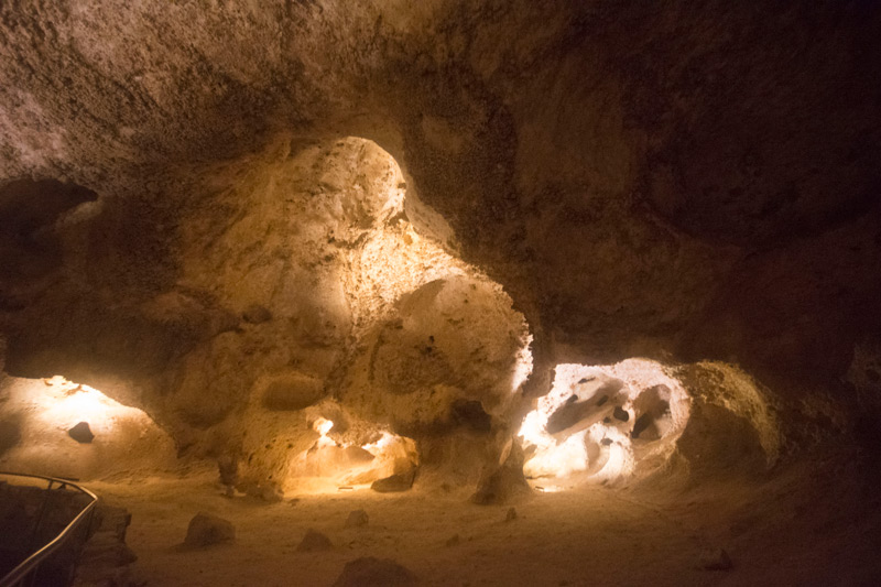 Openings in a cave, filled with stalactites.