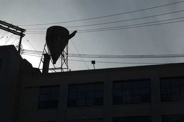 An
industrial funnel on top of a building