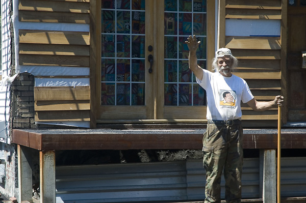 A man pauses from his work to wave hello to me, a stranger.