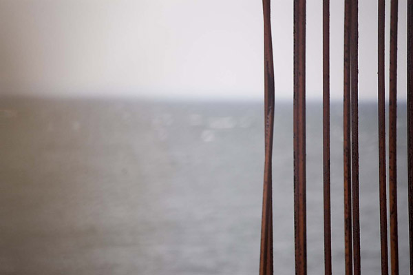 A terrace's vertical lines stand out against the Atlantic
Ocean.