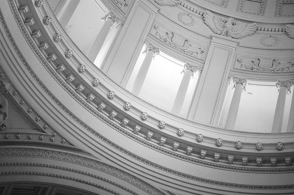 Columns, eagles, and lion heads below the dome.