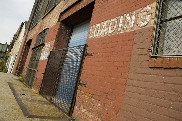 A loading dock, with protective fencing, shown at an angle.