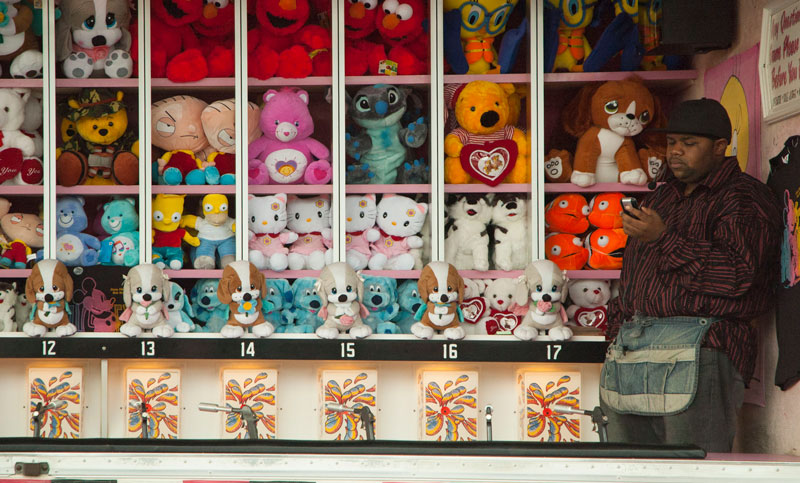 Rows of stuffed animals at a game booth at Coney Island.