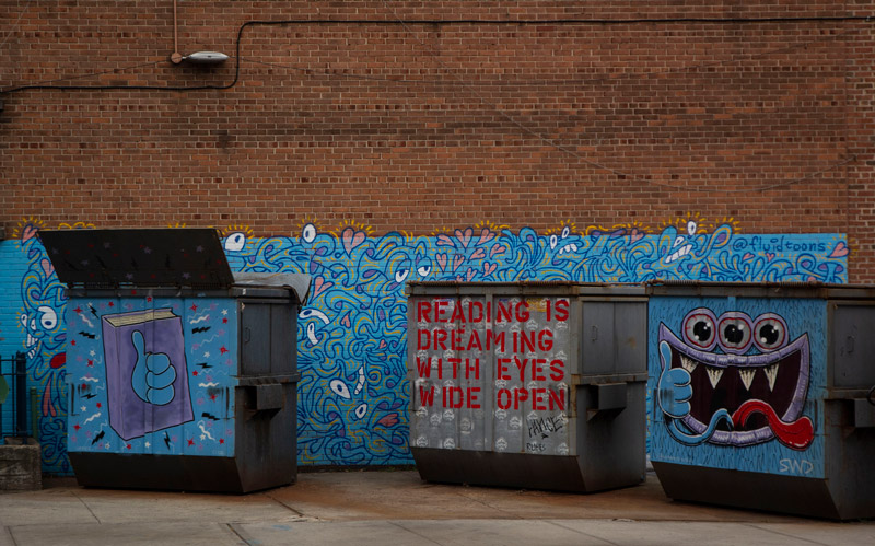 The photo shows street art encouraging school kids to read.