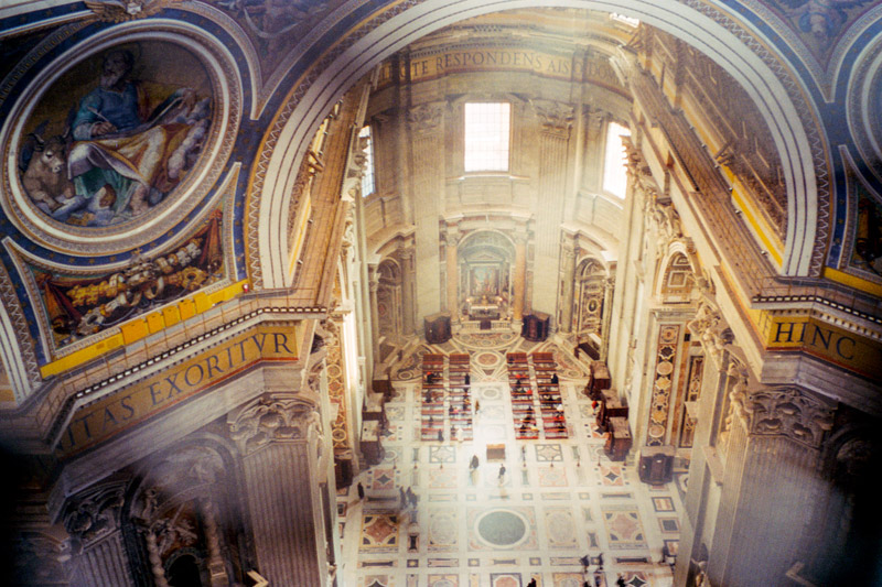 The photo shows the floor of St. Peter's Basilica, taken from the dome above.